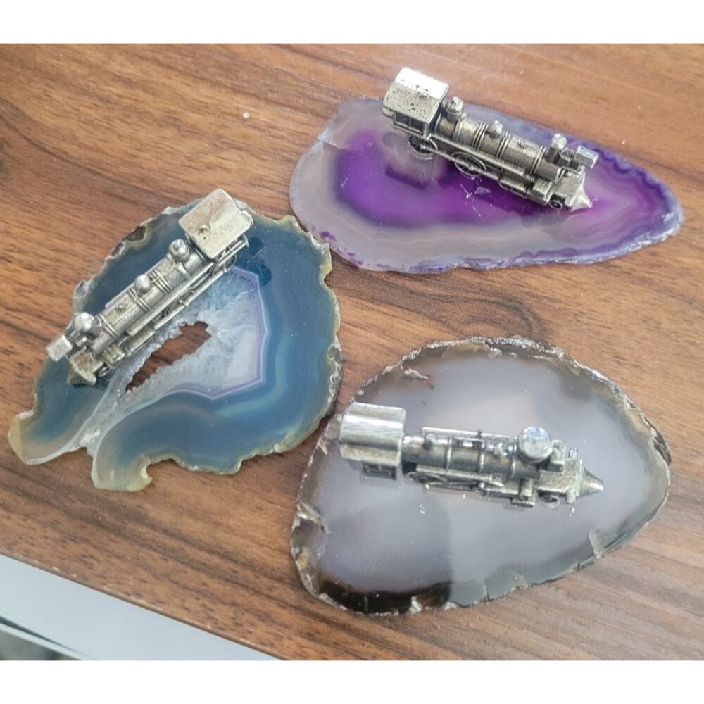 Agate Geode Polished Slices 3 with trains glued on them